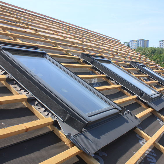 A Roof Under Construction With Skylights.