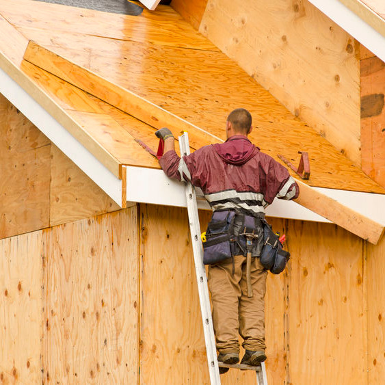 A Roofer Installing a Roof.