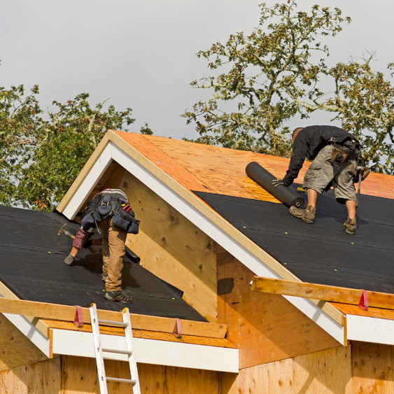 A Crew Building a Roof.