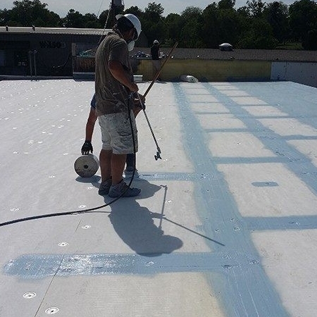 Roofers Repair a Flat Roof